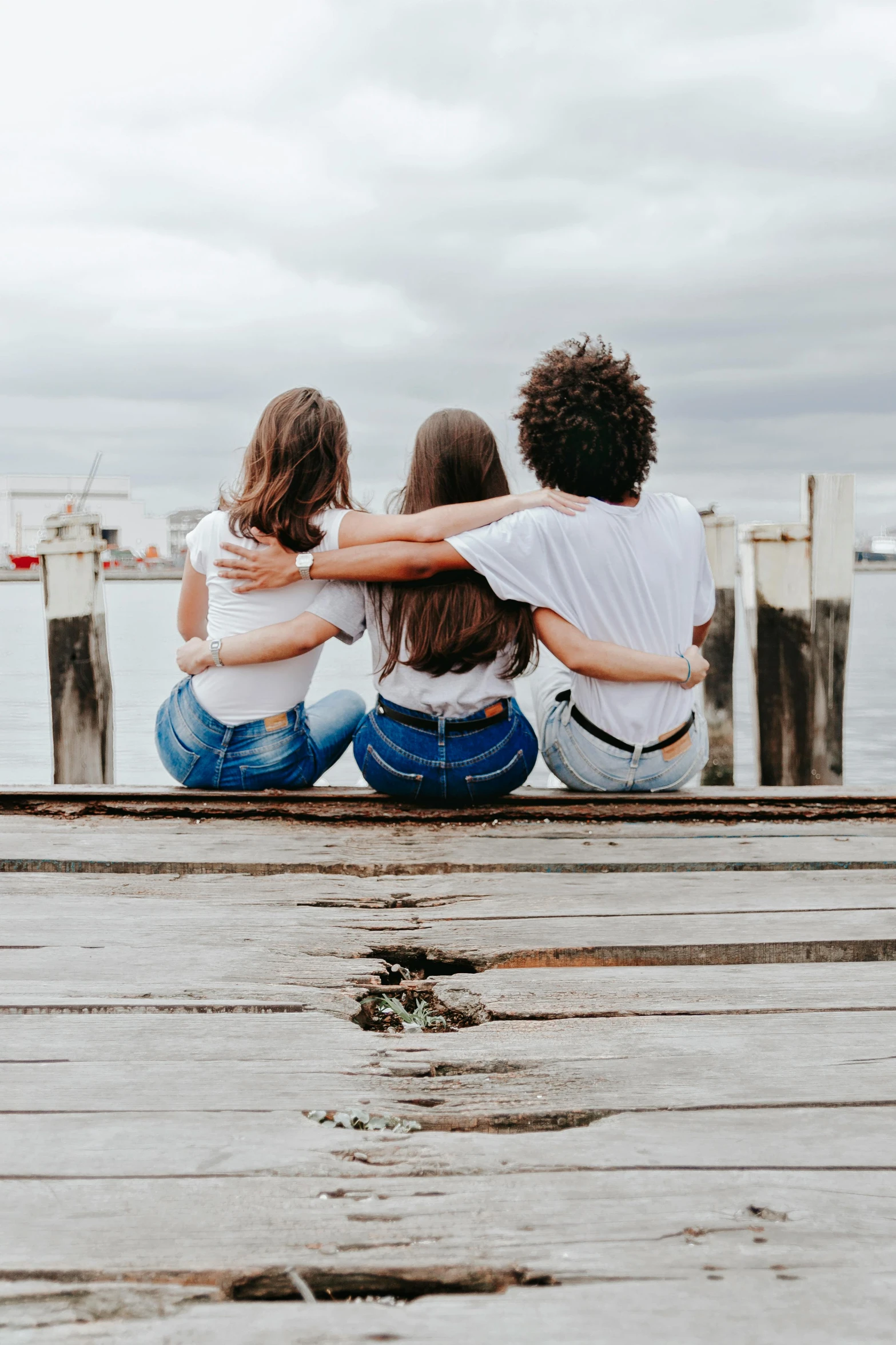 a group of s sitting on top of a pier