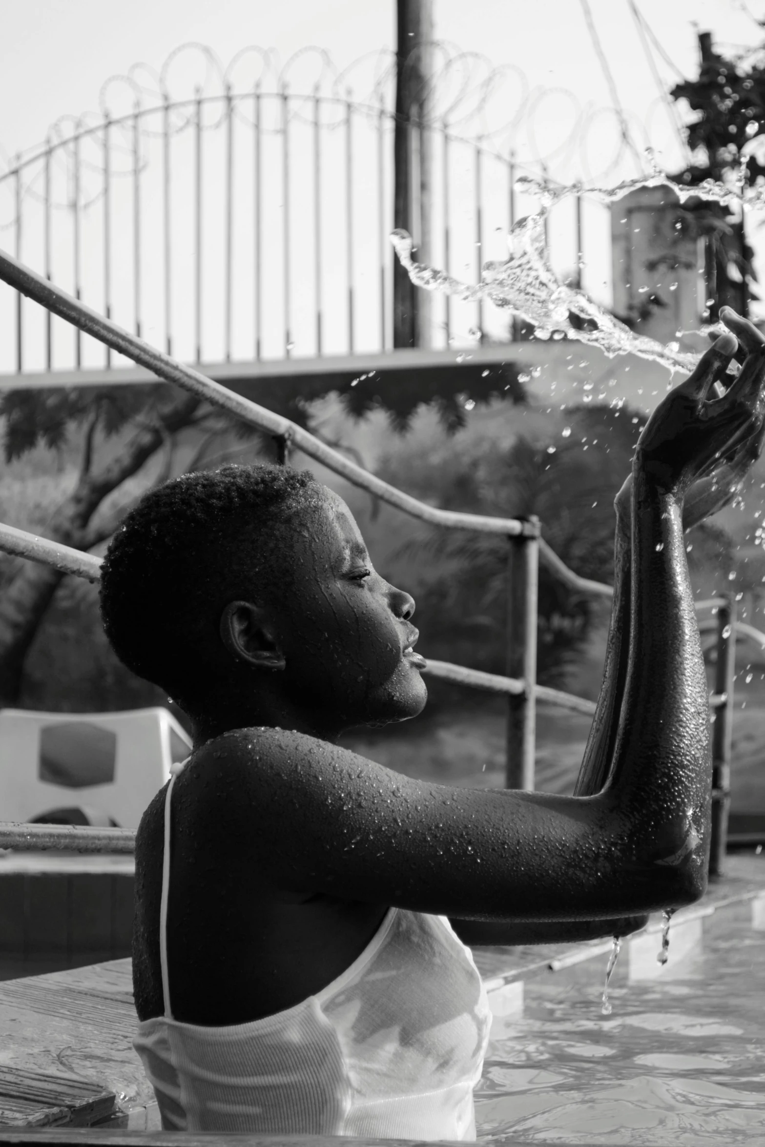 a  getting a bath in a pool