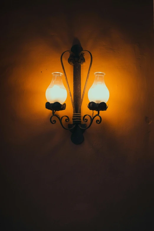 a street lamp at night lit up in the dark