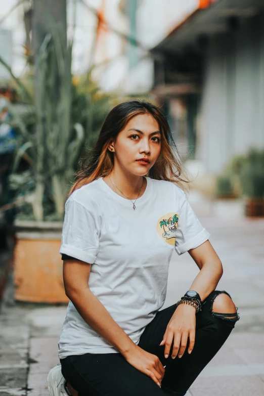 an image of woman sitting down looking serious