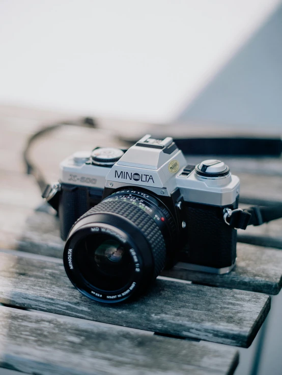 a camera that is on some wood