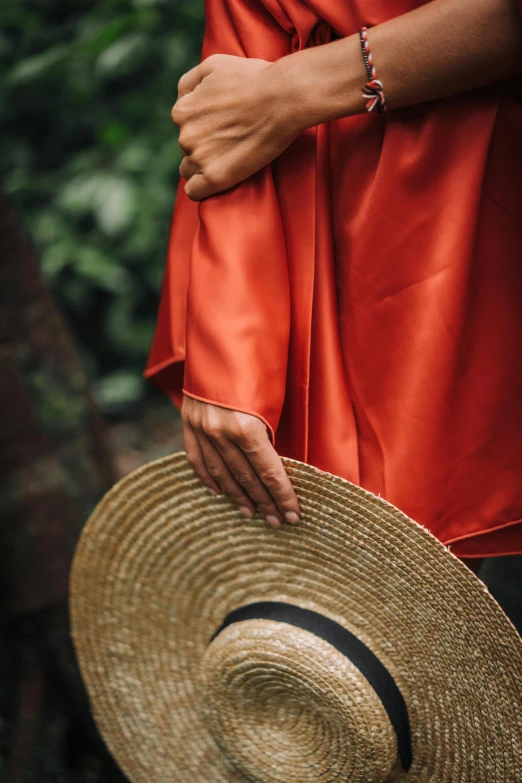 a person wearing a straw hat