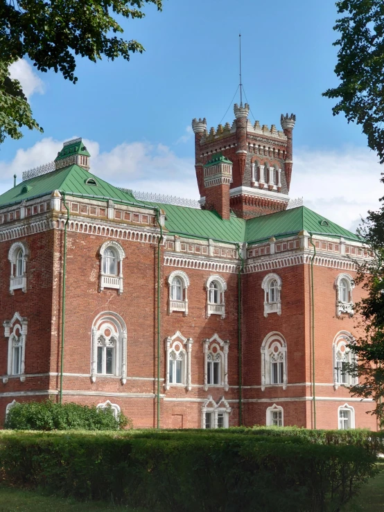 a building with a tall tower and many windows