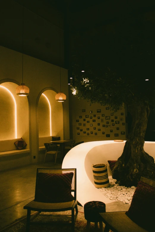 a couple of chairs in a room with lighting