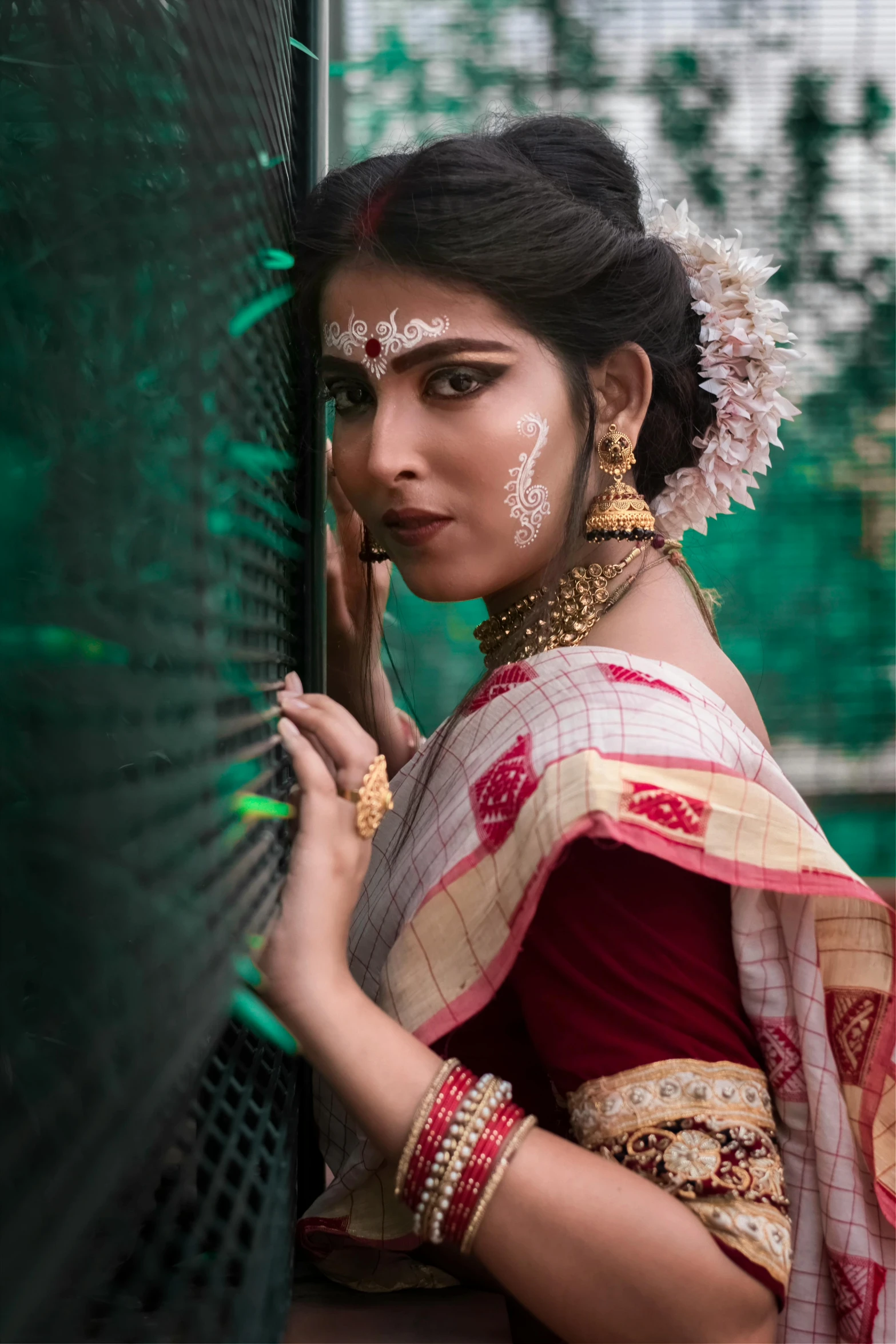 a woman with henna on holding on to her finger