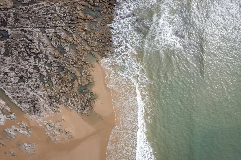 an aerial po of the coast and beach