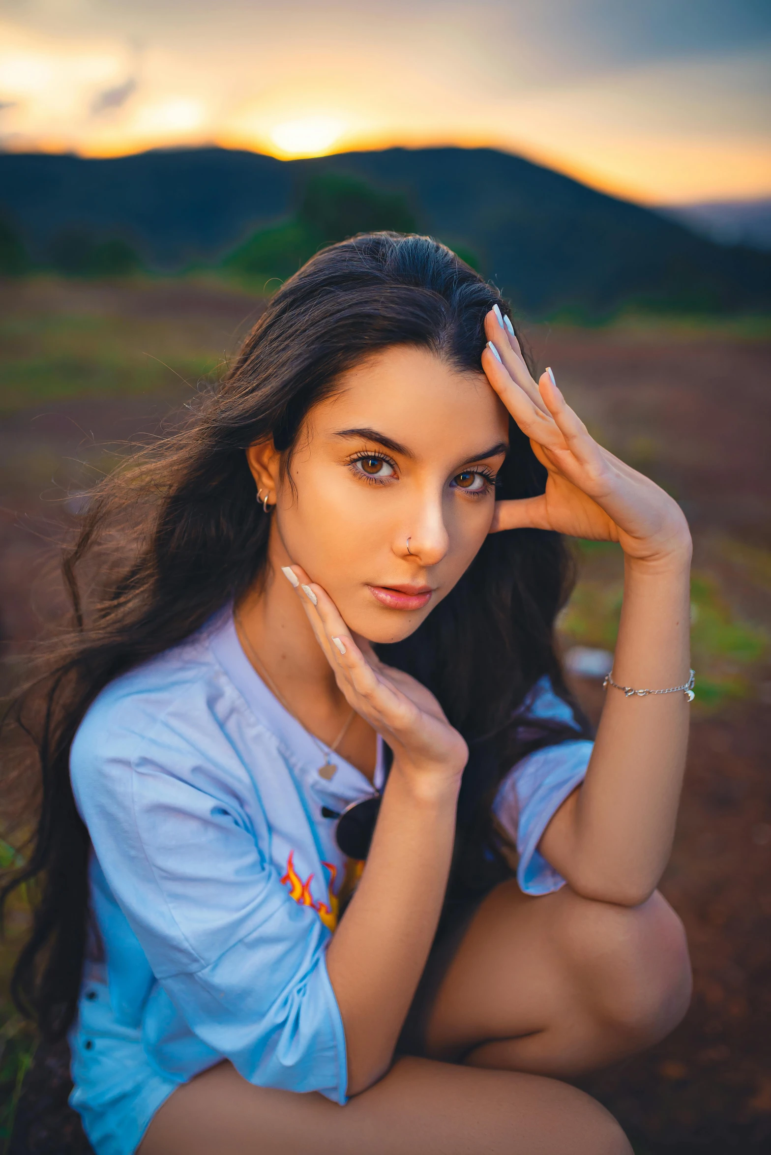 a beautiful woman with long hair posing