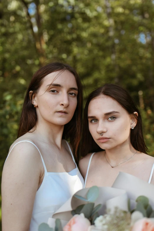 two women are looking at the camera