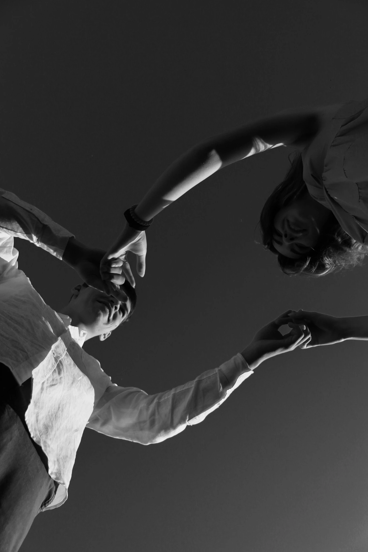 a black and white po of two people dancing