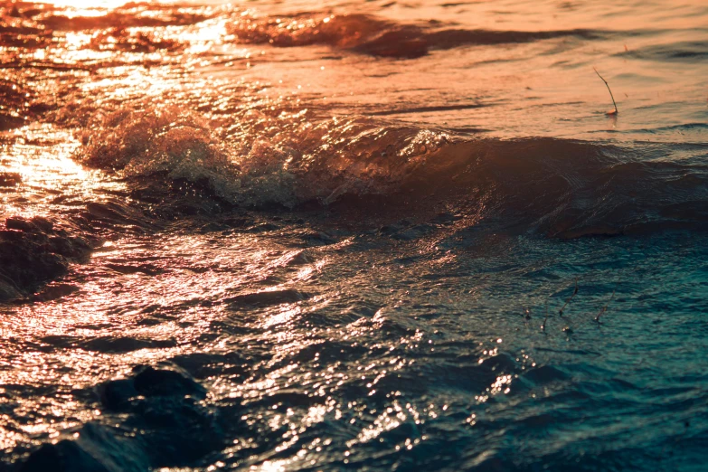 a person on a surfboard riding a wave