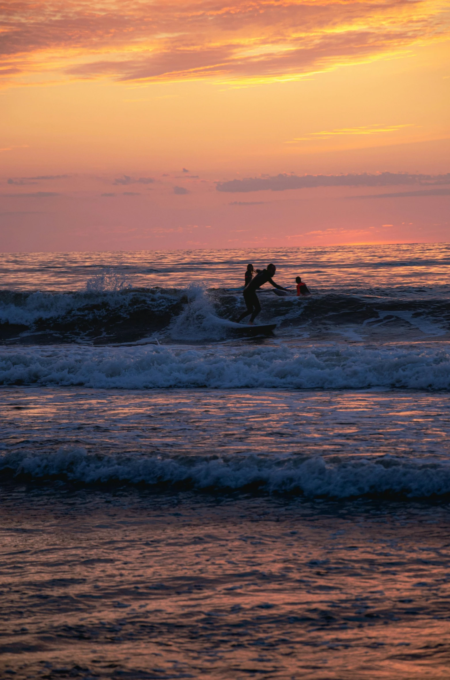 a man on a surf board rides up the ocean