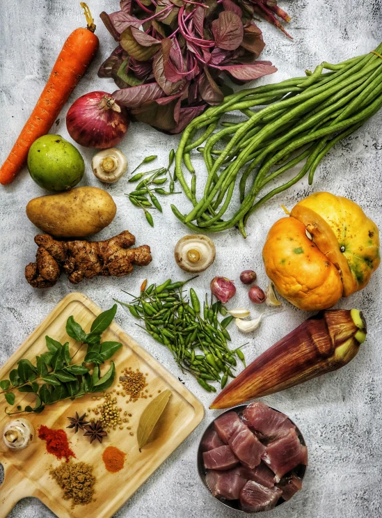 a display of vegetable and root selection laid out on a table