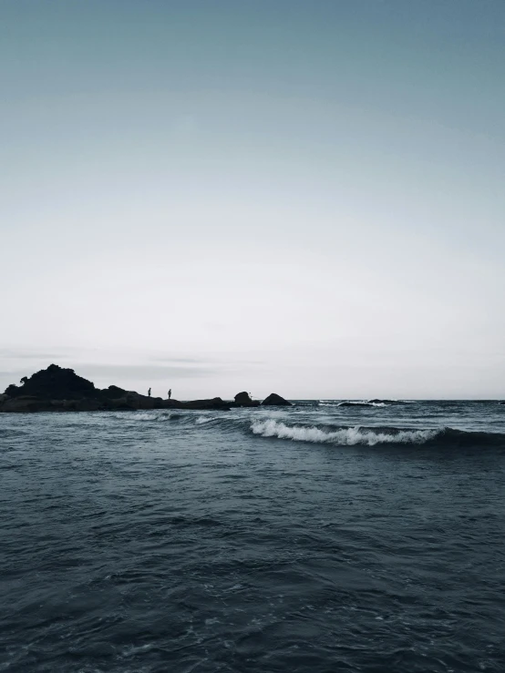 black and white po of waves on the ocean