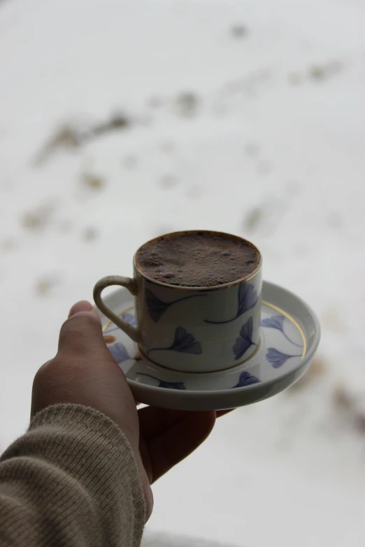 a cup of coffee that has just been taken out