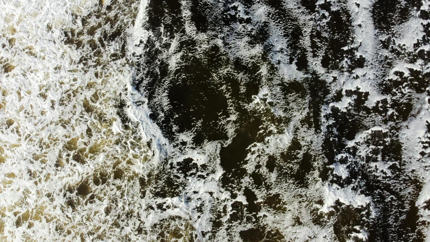 water and rocks seen from above at night