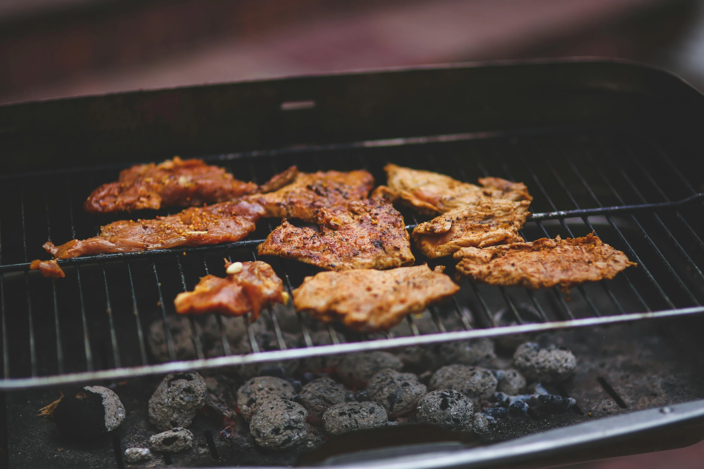 the food is being cooked on the grill