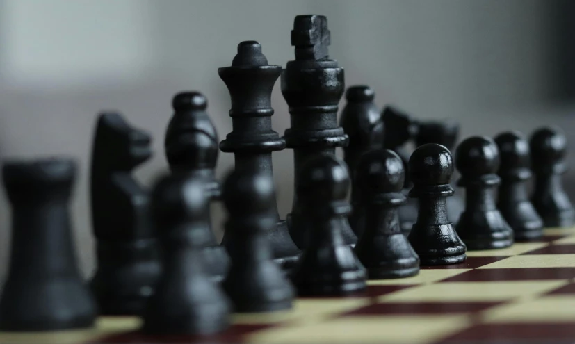 a group of chess pieces on a chess board