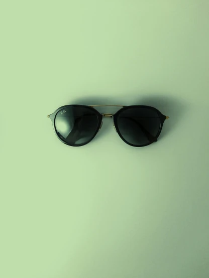 a pair of sunglasses with the top half facing towards the camera