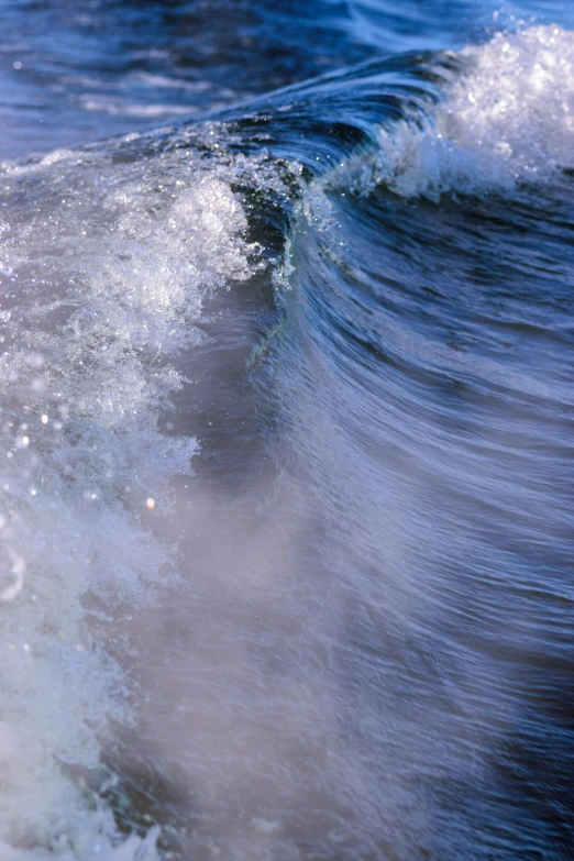 the front part of a wave is slightly above the water