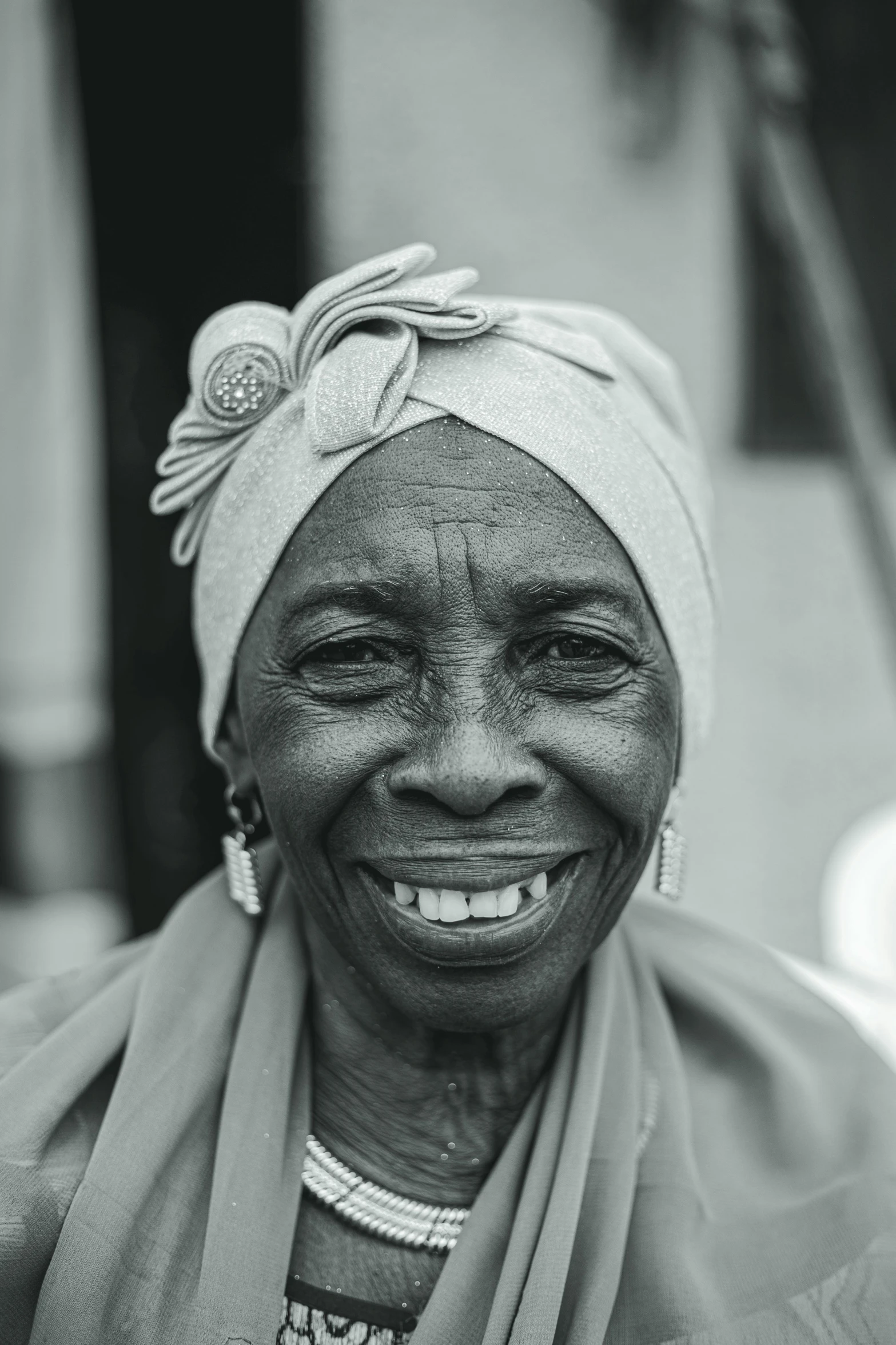 a black and white po of a smiling woman