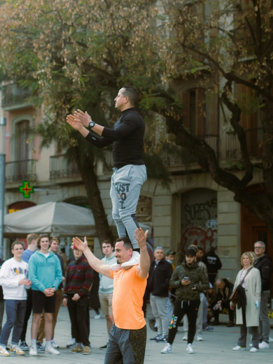 a man jumping up in the air while riding his skateboard