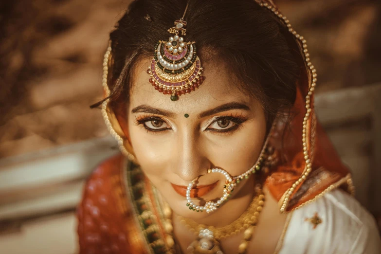 a woman with a nose ring and nose jewelry