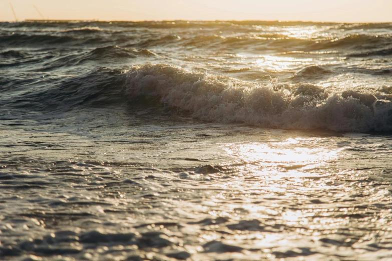 a small wave on a body of water