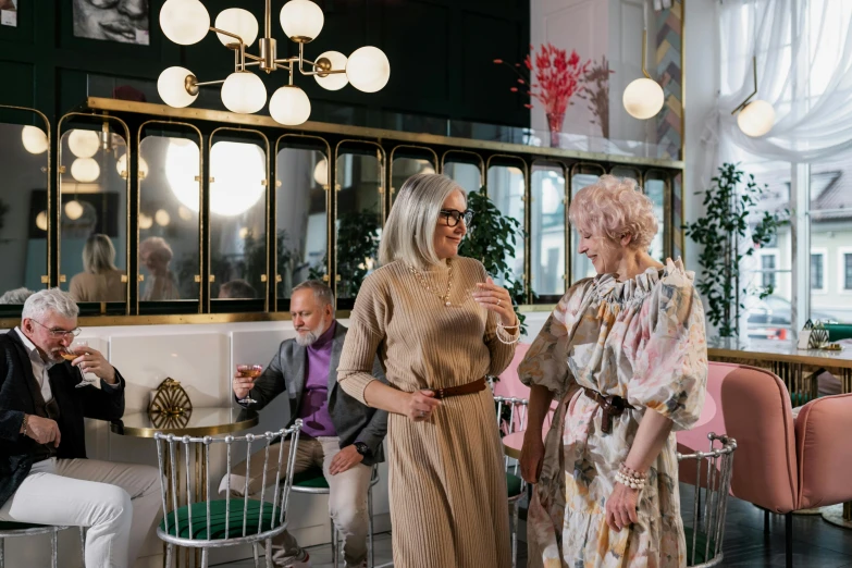 two women at an event in matching clothes