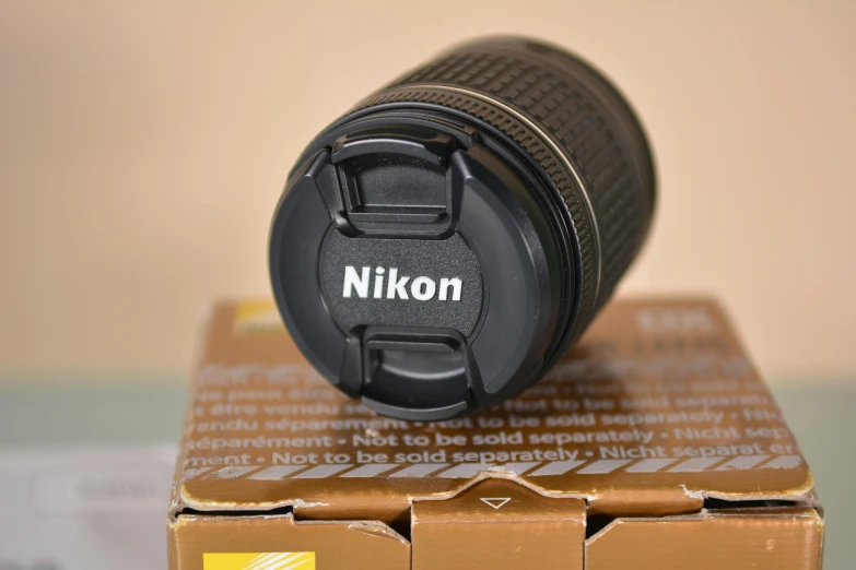 a close up s of the lens cap on a nikon camera