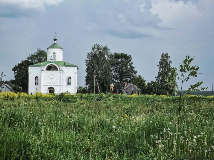 the small church is next to the forest