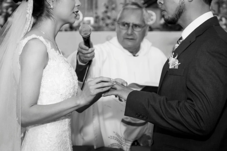 the bride and groom exchange vows to each other