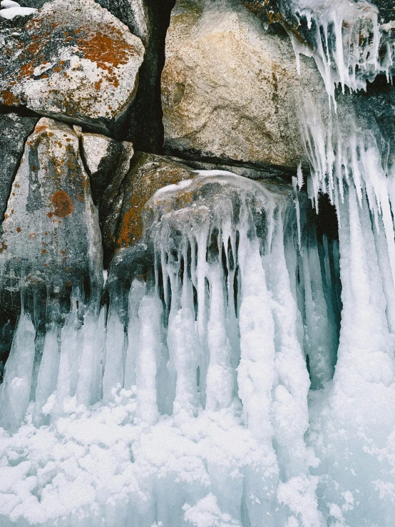 ice flows over a frozen stream at night