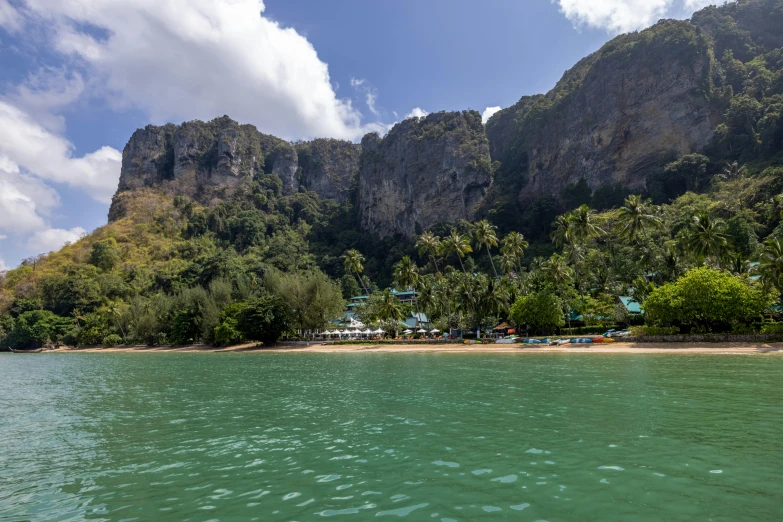 view of beach with mountains in the background