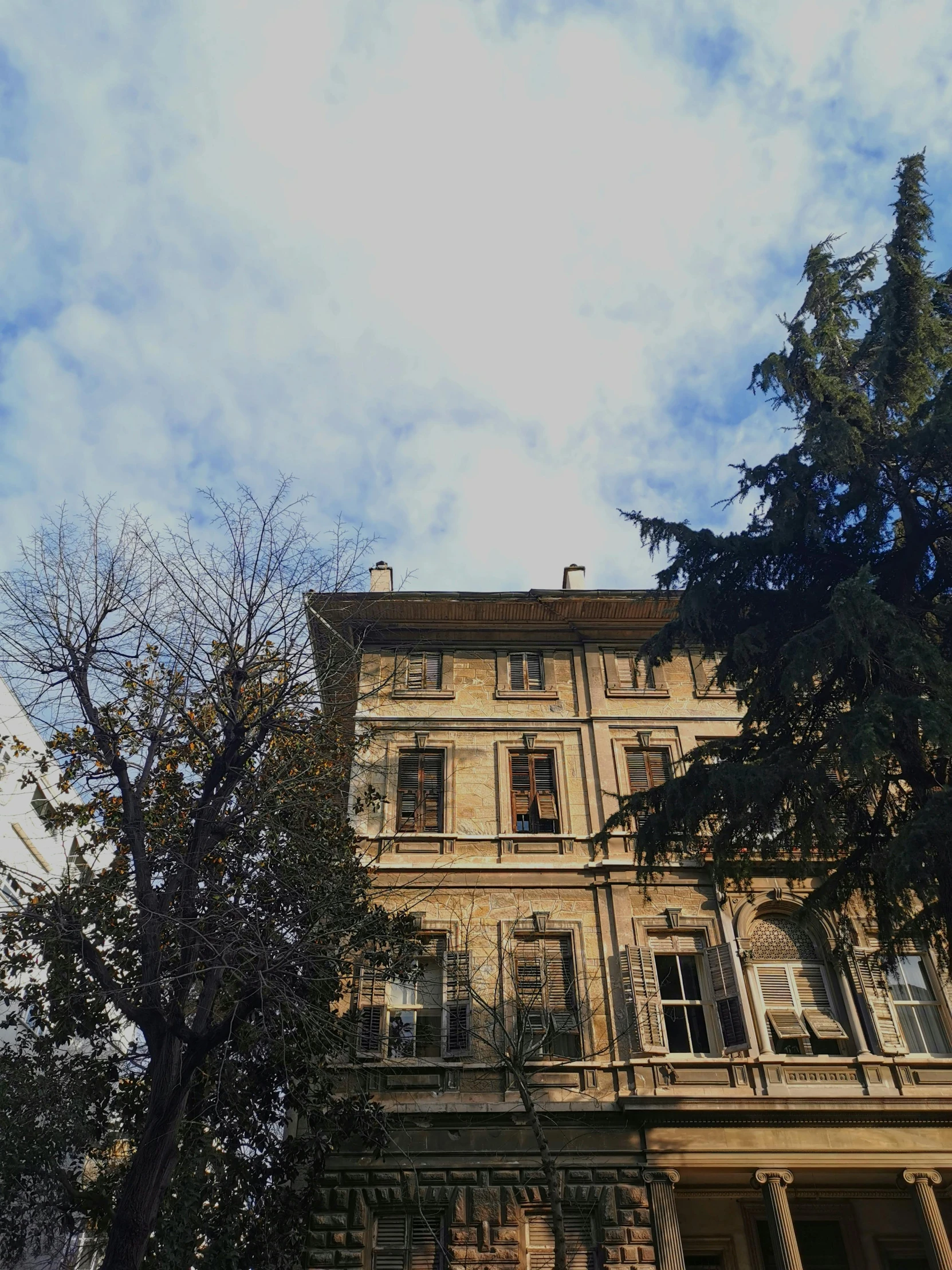 looking up at the architecture on top of a building