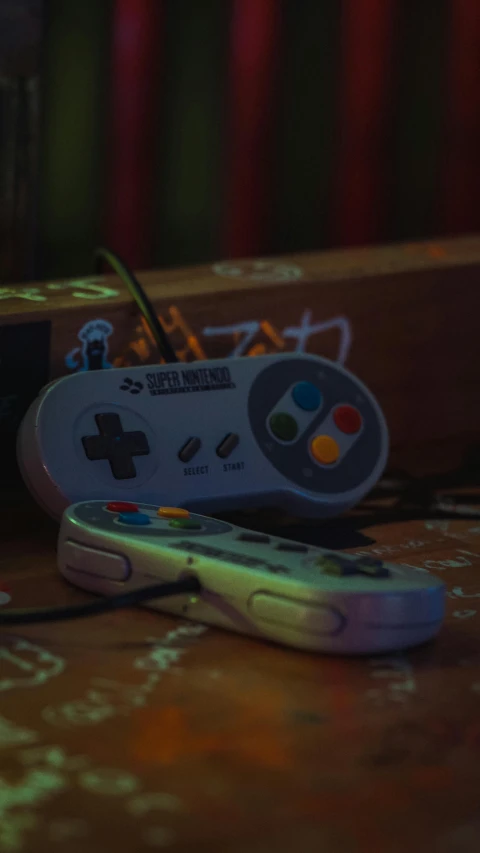 there is a video game controller next to it