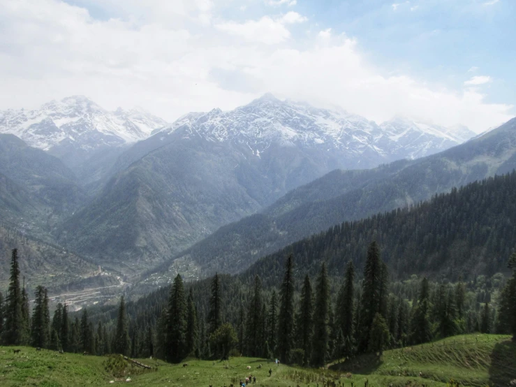 there are two mountains with snow on the tops