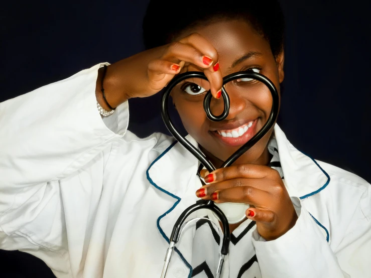 a woman is making a weird face with her hands