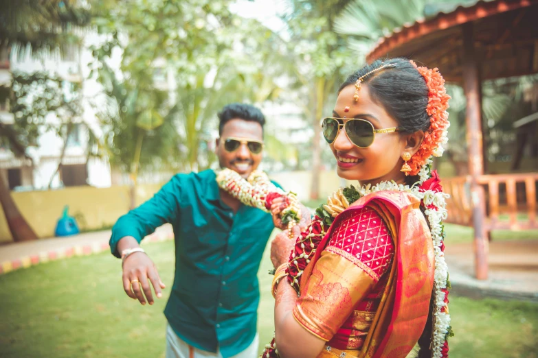 indian bride and groom at their wedding outside