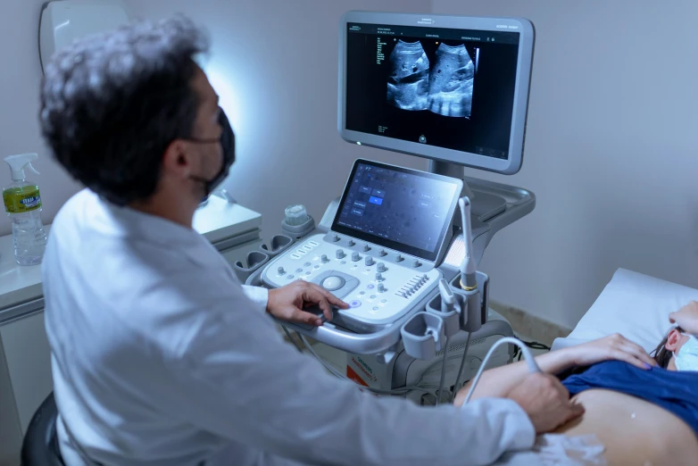 a woman being performed on the chest by an ot surgeon