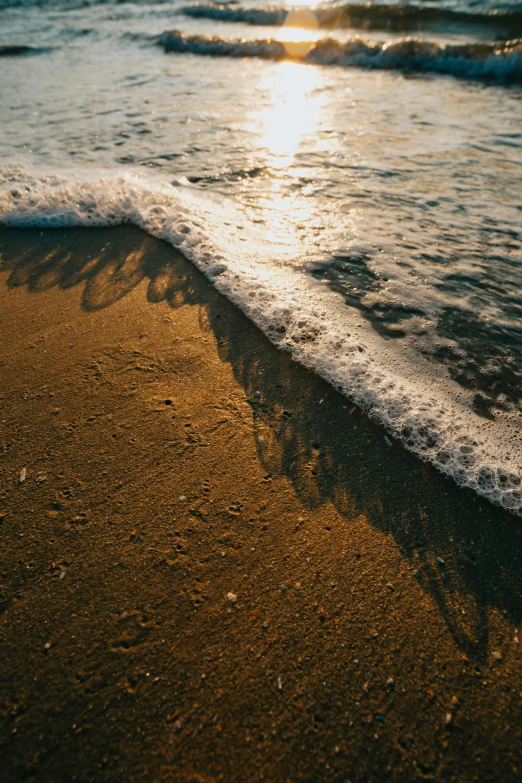 the beach is covered in sand and water