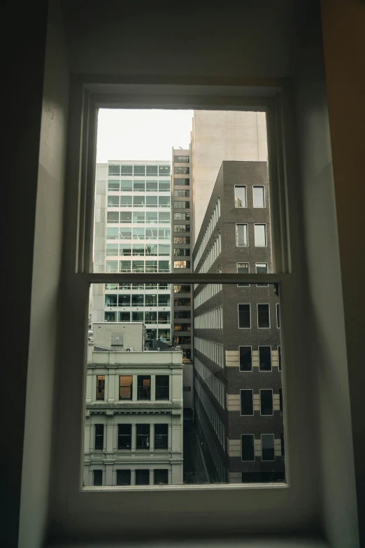 a po taken from a building looking at a bunch of buildings in the distance