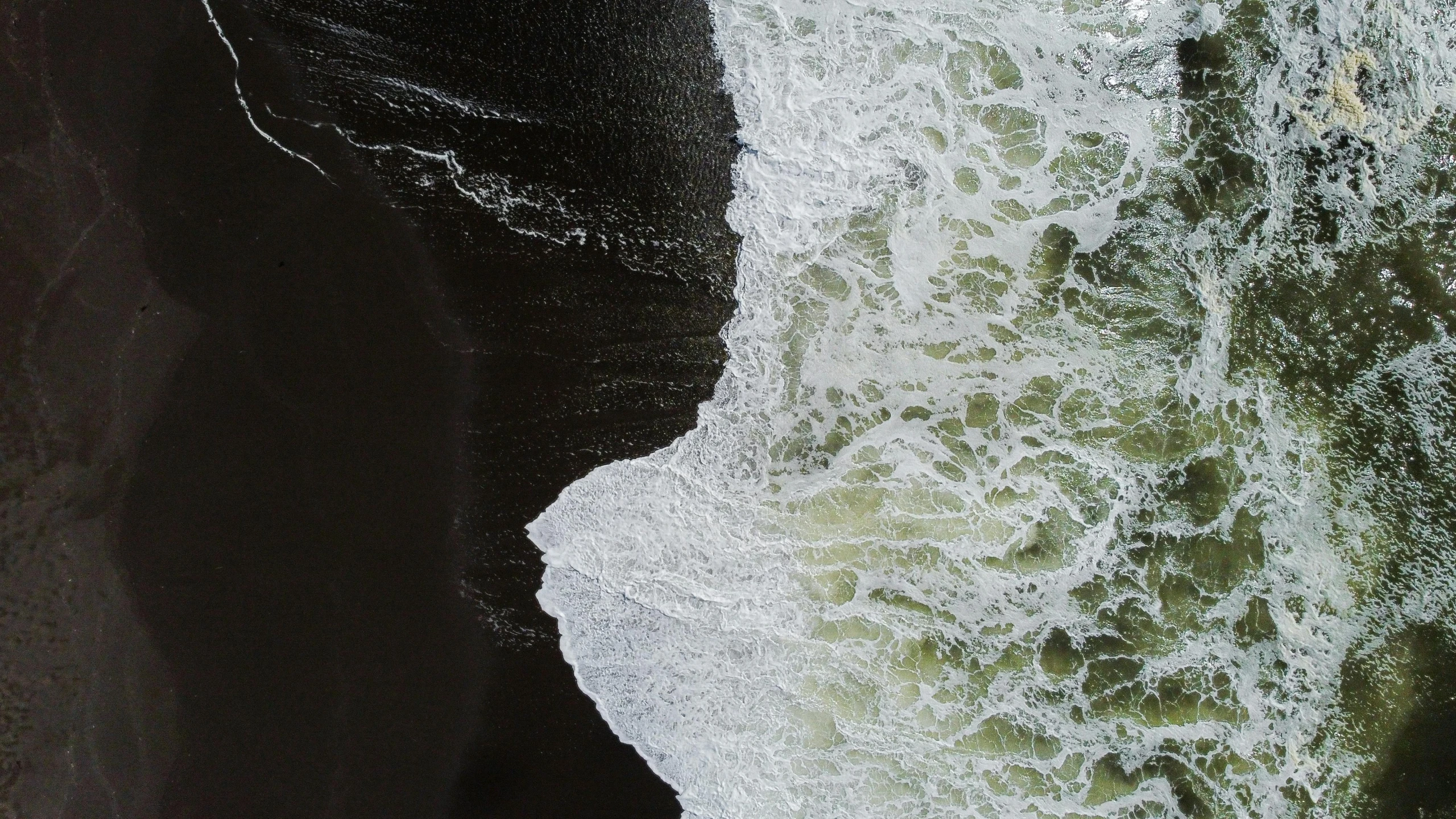 a bird's eye view of some water and rocks