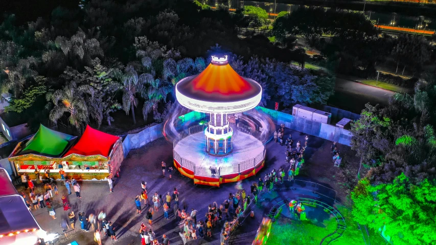 an aerial view of the fairground at night time