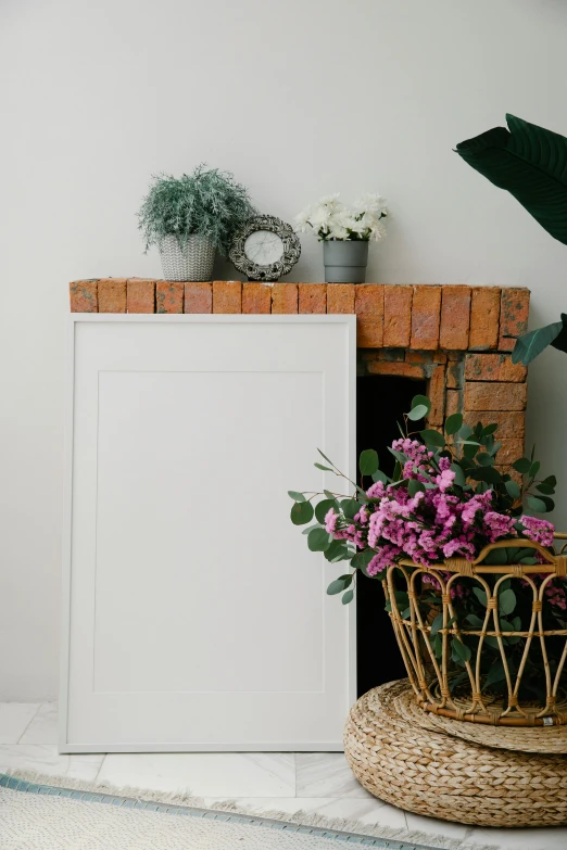 a flower pot next to a brick fire place