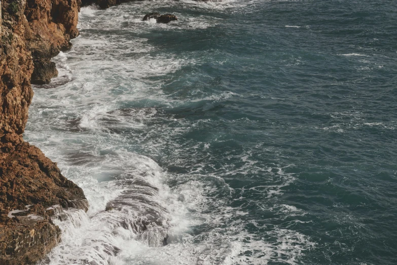 an area near the edge of a cliff on the coast