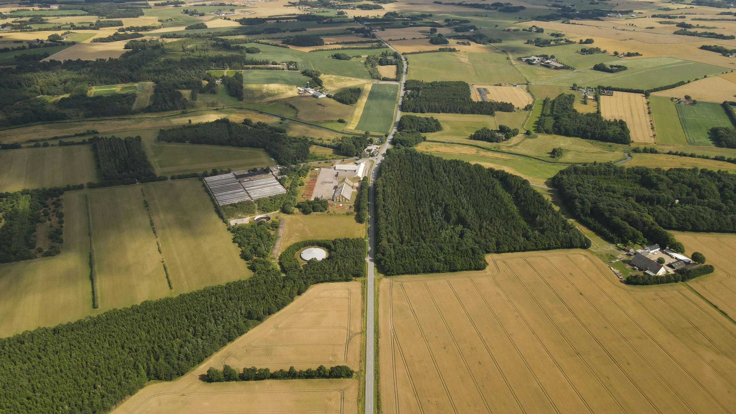 an aerial view of a large road through the countryside