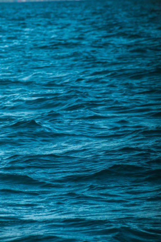 a man with an umbrella in the water