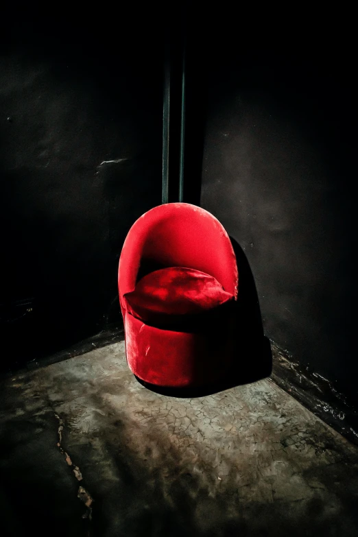 a chair sitting in the corner of a room