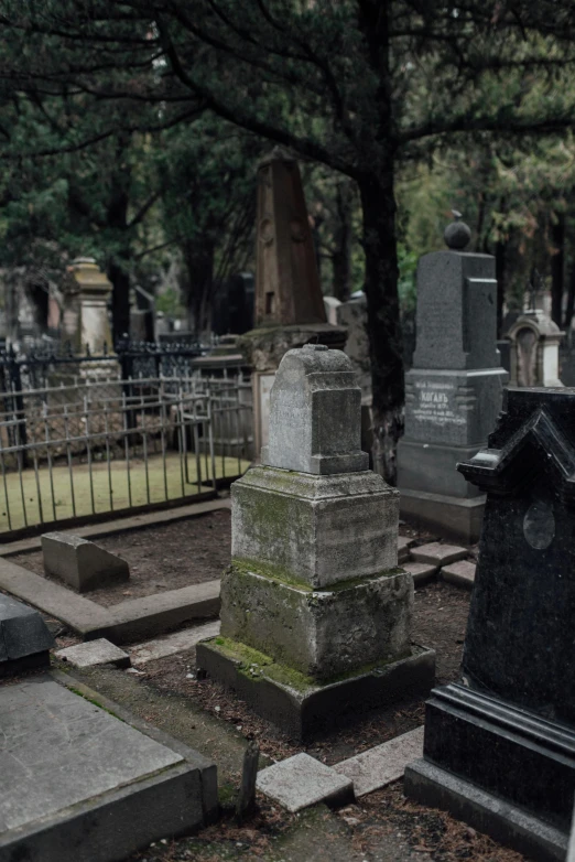 a large group of graves sitting in a cemetery