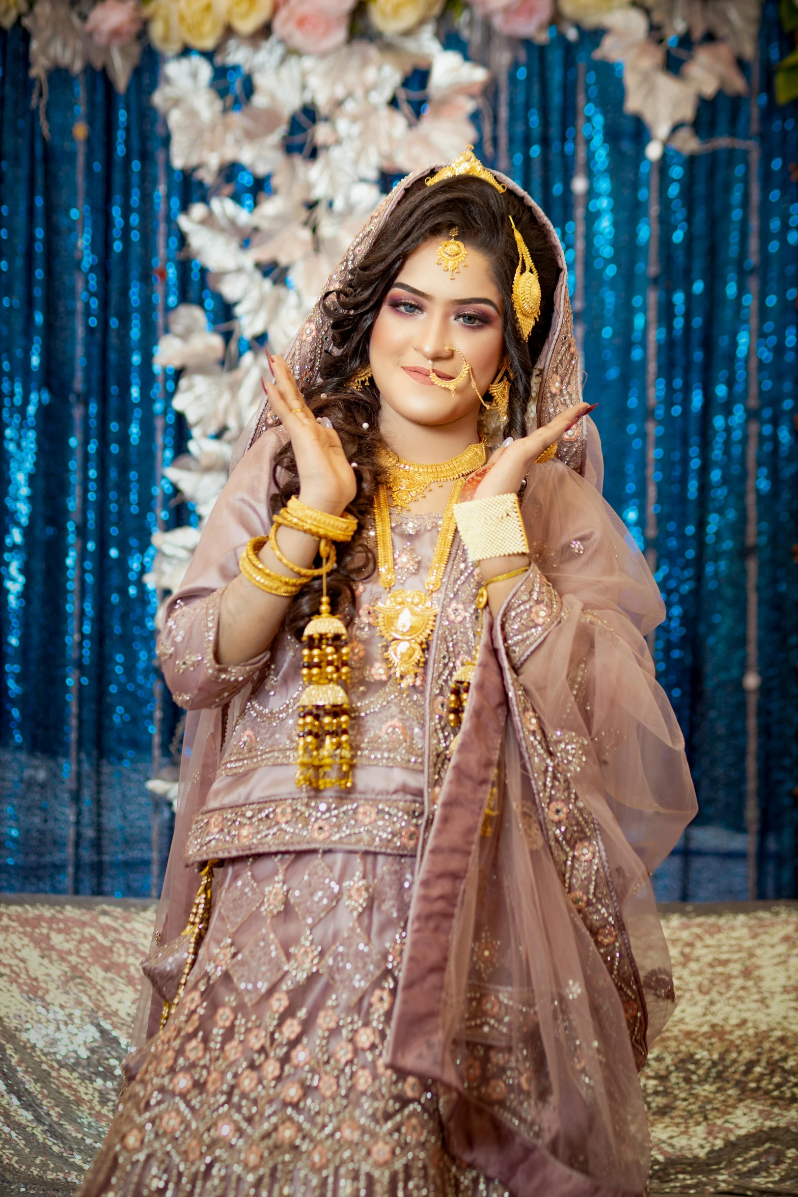 beautiful indian woman posing with a peace sign